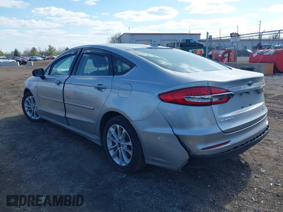 2020 Ford Fusion SE z VIN 3FA6P0LU8LR163896, wystawiony jako IAAI lot #41994803 z przebiegiem 89 892 mil mil oraz . Historia ofert i sprzedaży dostępna na DreamBid. Obrazek 3.