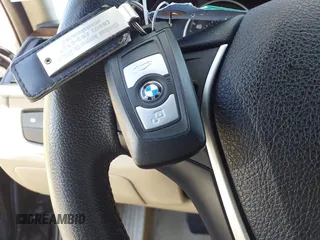 2014 BMW 3 Series 328i with VIN WBA3A5C55EP603035, listed as a IAAI auction lot 41771067 with 105,162 mi miles and . Bid and sale history available at carsss.com. Image 11.