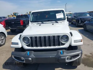2024 Jeep Wrangler Sahara with VIN 1C4RJXP64RW225507, listed as a IAAI auction lot 42245973 with 45,984 mi miles and . Bid and sale history available at DreamBid. Image 12.