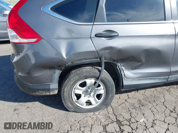 2014 Honda CR-V LX with VIN 2HKRM4H3XEH621242, listed as a IAAI auction lot 41734669 with 127,664 mi miles. Bid and sale history available at carsss.com. Image 6.