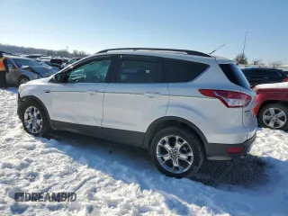 2014 Ford Escape SE with VIN 1FMCU9GX9EUC22928, listed as a Copart auction lot 87408914 with 191,227 mi miles and Salvage Title. Bid and sale history available at carsss.com. Image 2.