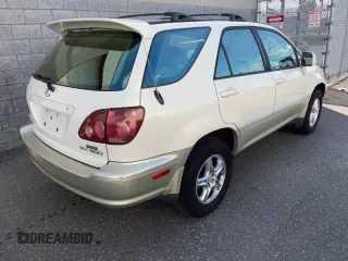 2000 Lexus RX 300 with VIN JT6HF10UXY0159914, listed as a Copart auction lot 82822194 with 220,515 mi miles and Clean Title. Bid and sale history available at carsss.com. Image 4.