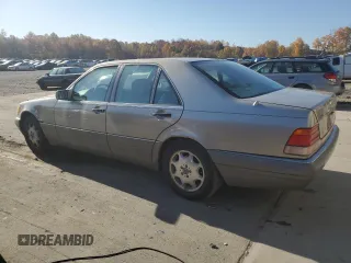 1995 Mercedes-Benz S 320 with VIN WDBGA32E6SA256435, listed as a Copart auction lot 77104234 with 309,498 mi miles and Clean Title. Bid and sale history available at DreamBid. Image 2.