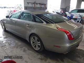 2013 Jaguar XJ Portfolio with VIN SAJWJ2GD0D8V50948, listed as a IAAI auction lot 42067884 with 110,053 mi miles and . Bid and sale history available at DreamBid. Image 3.