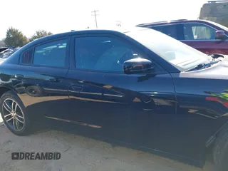 2019 Dodge Charger SXT with VIN 2C3CDXJG4KH710673, listed as a IAAI auction lot 41469797 with 102,011 mi miles and . Bid and sale history available at DreamBid. Image 14.