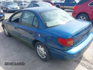 2002 Saturn SL z VIN 1G8ZG52822Z132267, wystawiony jako IAAI lot #41906634 z przebiegiem 144 001 mil mil oraz . Historia ofert i sprzedaży dostępna na DreamBid. Obrazek 3.