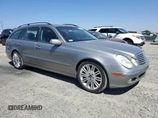 2005 Mercedes-Benz E 500 with VIN WDBUH83J35X168838, listed as a Copart auction lot 69885014 with 203,187 mi miles and Salvage Title. Bid and sale history available at carsss.com. Image 4.