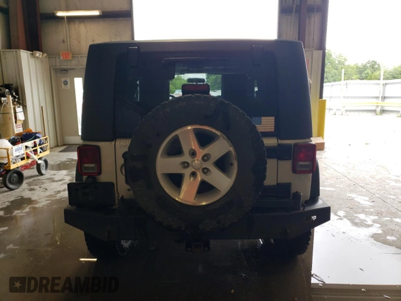 2007 Jeep Wrangler Rubicon z VIN 1J8GA64117L187431, wystawiony jako Copart lot #61293624 z przebiegiem 263 459 mil mil oraz Szkoda całkowita • Salvage title. Historia ofert i sprzedaży dostępna na DreamBid. Obrazek 6.
