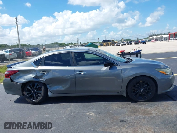2017 Nissan Altima S with VIN 1N4AL3AP0HC297523, listed as a IAAI auction lot 42525818 with 162,767 mi miles and . Bid and sale history available at DreamBid. Image 12.