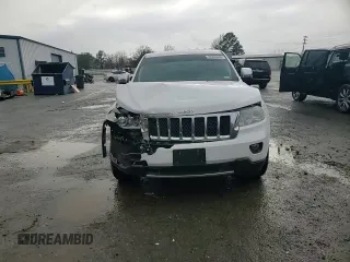 2013 Jeep Grand Cherokee Overland with VIN 1C4RJECT2DC590911, listed as a Copart auction lot 42939405 with 136,673 mi miles and Salvage Title. Bid and sale history available at carsss.com. Image 11.