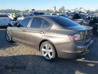 2013 BMW 3 Series 328i with VIN WBA3C1C56DK103447, listed as a IAAI auction lot 41698652 with 79,473 mi miles. Bid and sale history available at carsss.com. Image 3.