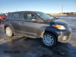2011 Scion xD z VIN JTKKU4B48B1010947, wystawiony jako Copart lot #84696564 z przebiegiem 240 330 mil mil oraz Szkody całkowita. Historia ofert i sprzedaży dostępna na DreamBid. Obrazek 4.