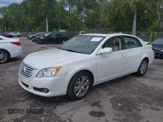 2010 Toyota Avalon XL with VIN 4T1BK3DB8AU354533, listed as a IAAI auction lot 41802797 with 117,956 mi miles and . Bid and sale history available at carsss.com. Image 2.
