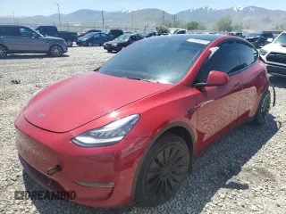 2022 Tesla Model Y Long Range z VIN 7SAYGDEE1NF360058, wystawiony jako Copart lot #57903045 z przebiegiem 67 089 mil mil oraz Tytuł czysty. Historia ofert i sprzedaży dostępna na DreamBid. Obrazek 1.