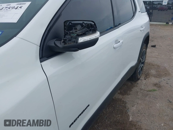 2021 GMC Acadia SLT with VIN 1GKKNMLS3MZ176996, listed as a IAAI auction lot 42475945 with 82,571 mi miles and . Bid and sale history available at DreamBid. Image 6.