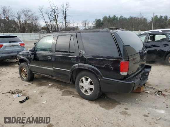 1998 Oldsmobile Bravada z VIN 1GHDT13W9W2730673, wystawiony jako Copart lot #80996524 z przebiegiem 126 418 mil mil oraz Nie do naprawy • Non repairable. Historia ofert i sprzedaży dostępna na DreamBid. Obrazek 2.