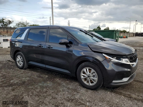 2023 Kia Carnival LX with VIN KNDNB4H38P6255833, listed as a Copart auction lot 86990124 with 6,818 mi miles and Salvage Title. Bid and sale history available at carsss.com. Image 4.