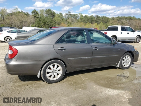 2003 Toyota Camry LE with VIN 4T1BE30K43U724778, listed as a Copart auction lot 53515605 with 176,568 mi miles and Salvage Title. Bid and sale history available at DreamBid. Image 3.