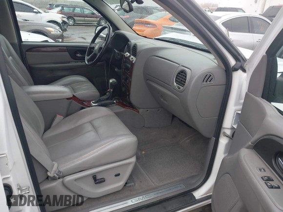 2008 GMC Envoy SLE2 with VIN 1GKDT13S482144358, listed as a IAAI auction lot 41797841 with 123,287 mi miles. Bid and sale history available at carsss.com. Image 5.