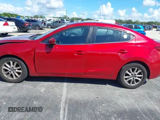 2016 Mazda 3 i Grand Touring with VIN JM1BM1X74G1282525, listed as a IAAI auction lot 40460438 with 216,301 mi miles and . Bid and sale history available at DreamBid. Image 14.