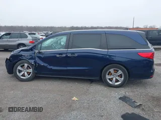 2020 Honda Odyssey EX-L with VIN 5FNRL6H70LB055122, listed as a IAAI auction lot 41620219 with 129,582 mi miles. Bid and sale history available at carsss.com. Image 14.