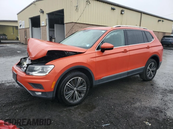 2019 Volkswagen Tiguan SE with VIN 3VV2B7AX7KM013949, listed as a Copart auction lot 51662645 with 74,039 mi miles and Salvage Title. Bid and sale history available at DreamBid. Image 1.