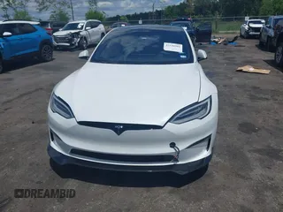 2021 Tesla Model S Plaid с VIN 5YJSA1E62MF438406, выставлен на аукционе IAAI как лот 42246901 с пробегом Не указан миль и . История ставок и продаж доступна на DreamBid. Изображение 12.