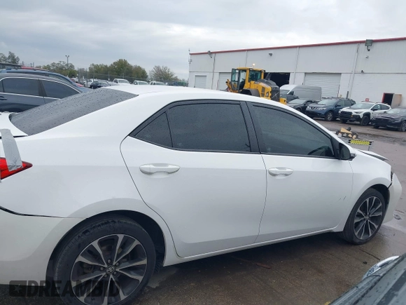 2017 Toyota Corolla L z VIN 2T1BURHE8HC764049, wystawiony jako IAAI lot #41653699 z przebiegiem 401 813 mil mil oraz . Historia ofert i sprzedaży dostępna na DreamBid. Obrazek 13.