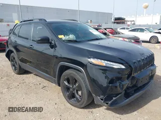 2017 Jeep Cherokee Altitude with VIN 1C4PJLAB4HW661486, listed as a IAAI auction lot 42637171 with 89,776 mi miles and . Bid and sale history available at DreamBid. Image 1.