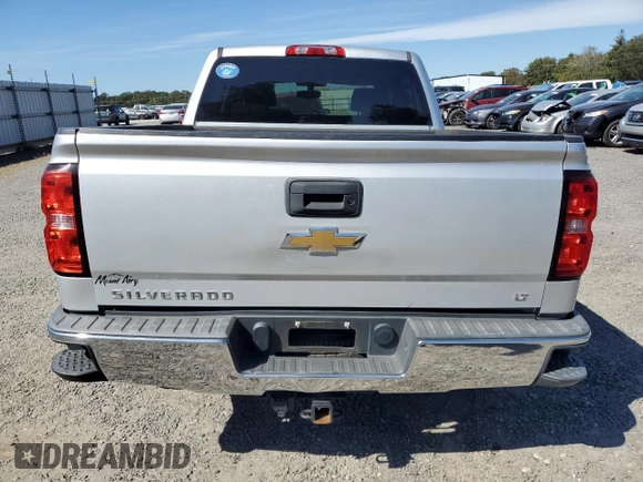 2015 Chevrolet Silverado 1500 LT with VIN 3GCUKREH2FG242873, listed as a Copart auction lot 73356814 with 131,045 mi miles and Salvage Title. Bid and sale history available at DreamBid. Image 6.
