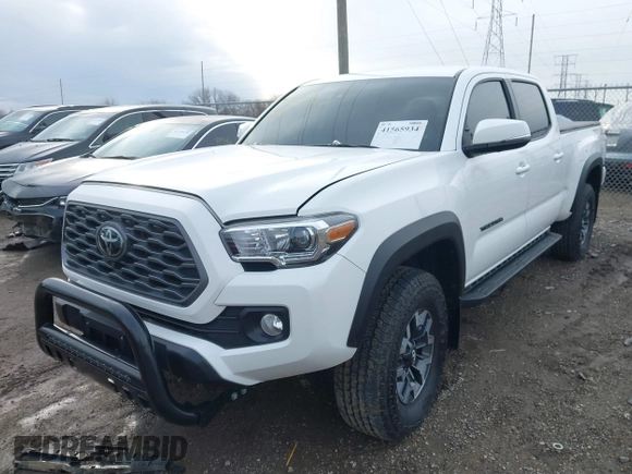 2023 Toyota Tacoma SR5 z VIN 3TMDZ5BN2PM144461, wystawiony jako IAAI lot #41565934 z przebiegiem 75 547 mil mil oraz . Historia ofert i sprzedaży dostępna na DreamBid. Obrazek 17.
