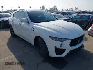2023 Maserati Levante z VIN ZN661YUM6PX411566, wystawiony jako IAAI lot #41219590 z przebiegiem 24 613 mil mil oraz . Historia ofert i sprzedaży dostępna na DreamBid. Obrazek 1.