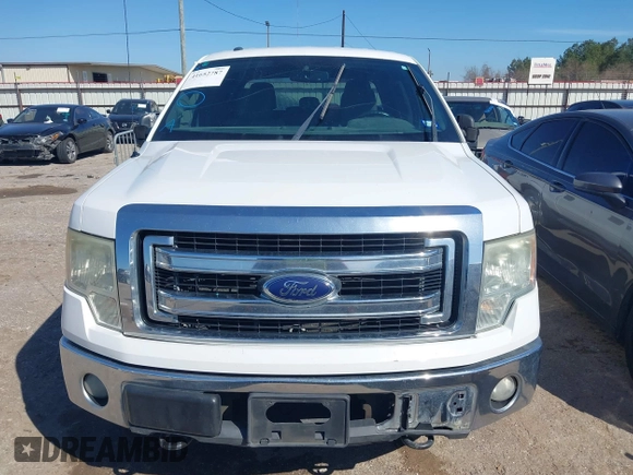 2014 Ford F-150 XL with VIN 1FTFW1EF1EFC93570, listed as a IAAI auction lot 41652787 with 265,015 mi miles. Bid and sale history available at carsss.com. Image 12.