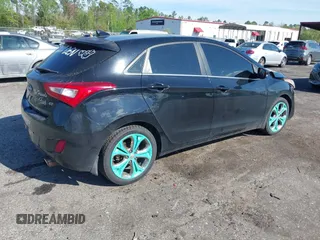 2014 Hyundai Elantra GT with VIN KMHD35LH5EU171569, listed as a IAAI auction lot 41882896 with 181,989 mi miles. Bid and sale history available at carsss.com. Image 4.