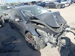 2022 Tesla Model 3 Performance with VIN 5YJ3E1EC3NF194197, listed as a IAAI auction lot 41825401 with Not Provided miles and . Bid and sale history available at carsss.com. Image 1.