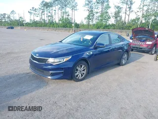 2017 Kia Optima LX with VIN 5XXGT4L35HG174613, listed as a IAAI auction lot 42097790 with 243,335 mi miles. Bid and sale history available at carsss.com. Image 2.