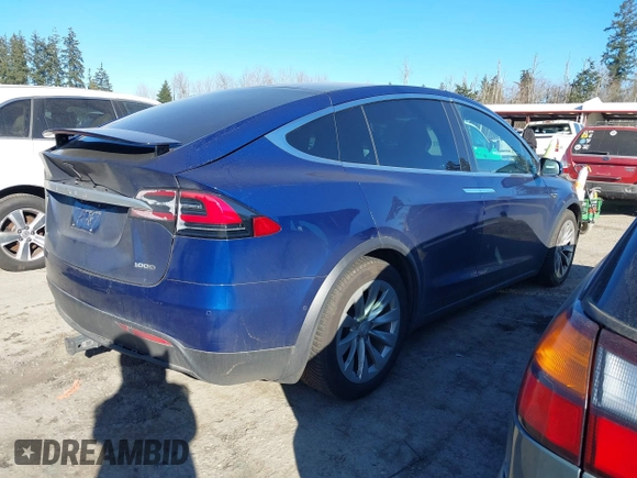 2017 Tesla Model X 90D z VIN 5YJXCBE21HF076514, wystawiony jako IAAI lot #41559020 z przebiegiem 108 573 mil mil oraz . Historia ofert i sprzedaży dostępna na DreamBid. Obrazek 4.