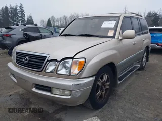 1999 Lexus LX 470 z VIN JT6HT00W4X0056023, wystawiony jako IAAI lot #41319329 z przebiegiem 206 974 mil mil oraz . Historia ofert i sprzedaży dostępna na DreamBid. Obrazek 2.