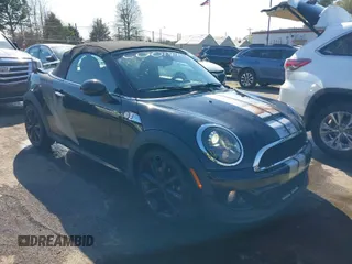 2012 MINI Roadster S with VIN WMWSY3C56CT144291, listed as a IAAI auction lot 41881864 with 89,403 mi miles and . Bid and sale history available at DreamBid. Image 1.
