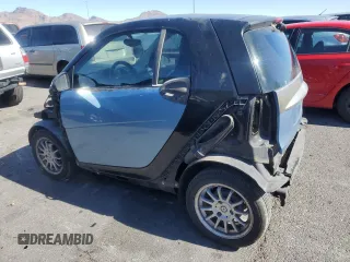 2011 Smart fortwo Pure z VIN WMEEJ3BA2BK427313, wystawiony jako Copart lot #46875525 z przebiegiem 90 435 mil mil oraz Szkoda całkowita • Salvage title. Historia ofert i sprzedaży dostępna na DreamBid. Obrazek 2.