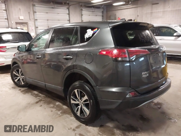 2018 Toyota RAV4 XLE with VIN 2T3RFREVXJW788412, listed as a IAAI auction lot 41931142 with 119,962 mi miles. Bid and sale history available at carsss.com. Image 3.
