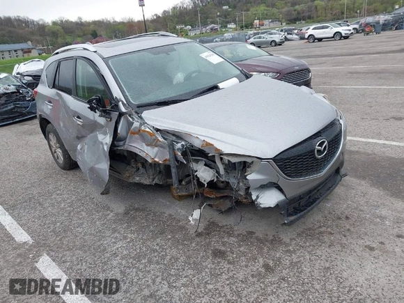 2014 Mazda CX-5 Touring with VIN JM3KE4CY1E0426409, listed as a IAAI auction lot 41924258 with 116,956 mi miles. Bid and sale history available at carsss.com. Image 1.