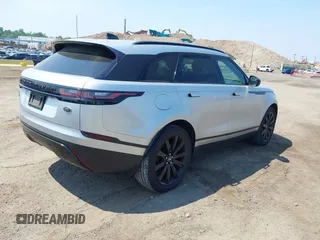 2020 Land Rover Range Rover Velar S z VIN SALYB2EX4LA242330, wystawiony jako IAAI lot #42479335 z przebiegiem 99 712 mil mil oraz . Historia ofert i sprzedaży dostępna na DreamBid. Obrazek 4.