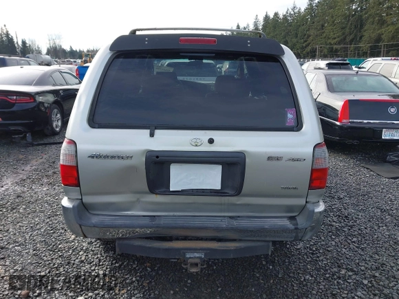 1999 Toyota 4Runner SR5 z VIN JT3HN86R0X0196528, wystawiony jako IAAI lot #41666499 z przebiegiem 294 216 mil mil oraz . Historia ofert i sprzedaży dostępna na DreamBid. Obrazek 16.