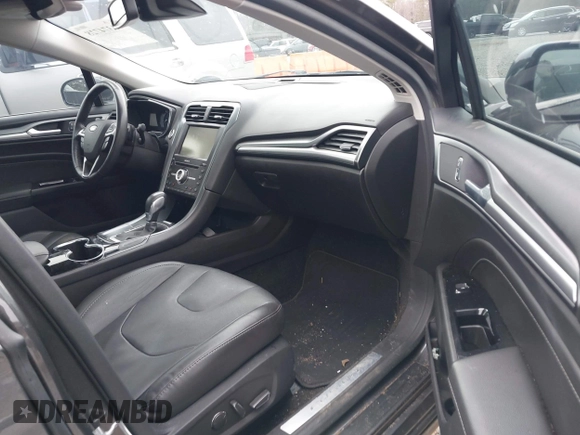 2016 Ford Fusion Titanium with VIN 3FA6P0K94GR183257, listed as a IAAI auction lot 41374728 with 67,780 mi miles and . Bid and sale history available at carsss.com. Image 5.