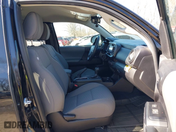 2023 Toyota Tacoma SR with VIN 3TYRX5GN9PT075342, listed as a IAAI auction lot 41652456 with 9,690 mi miles and . Bid and sale history available at DreamBid. Image 5.