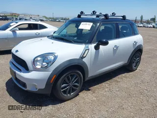 2014 MINI Countryman S z VIN WMWZC3C56EWP52407, wystawiony jako IAAI lot #42255716 z przebiegiem 74 943 mil mil oraz . Historia ofert i sprzedaży dostępna na DreamBid. Obrazek 2.