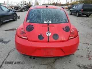 2013 Volkswagen Beetle with VIN 3VWHX7AT8DM604332, listed as a Copart auction lot 79781264 with 125,692 mi miles and Salvage Title. Bid and sale history available at DreamBid. Image 6.