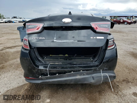 2014 Kia Optima EX with VIN KNAGN4AD0E5068864, listed as a Copart auction lot 64991005 with 125,108 mi miles and Salvage title. Bid and sale history available at DreamBid. Image 6.