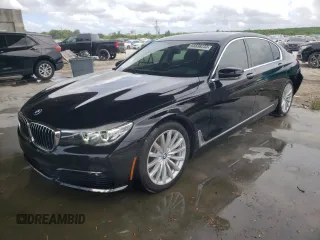 2017 BMW 7 Series 740i with VIN WBA7E2C31HG741176, listed as a Copart auction lot 65698233 with 27,332 mi miles. Bid and sale history available at carsss.com. Image 1.